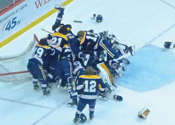 Wayzata lacked a star, but all four lines contributed to the Trojans first Class AA state hockey title. Photo Credit: John Gilbert