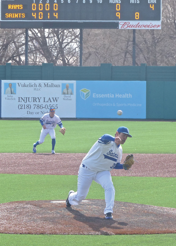 Gino Strebing got the call to start Tuesday’s home opener for St. Scholastica, and the senior responded by throwing a no-hitter in a 14-1 romp over North Central at Wade Stadium. Photo credit: John Gilbert