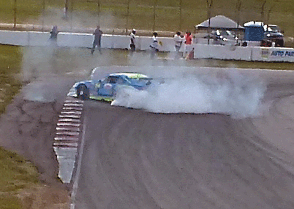 Tommy Archer's Camaro provided a video highlight when it spun in Turn 12, dropping him from second to fifth. Photo credit: John Gilbert