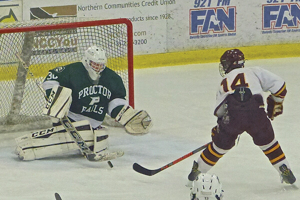 Denfeld's Ryan Lemker was stopped by Proctor goaltender Braxton Sathers, after scoring to start the Hunters to their 6-1 Section 7A triumph. Photo Credit: John Gilbert