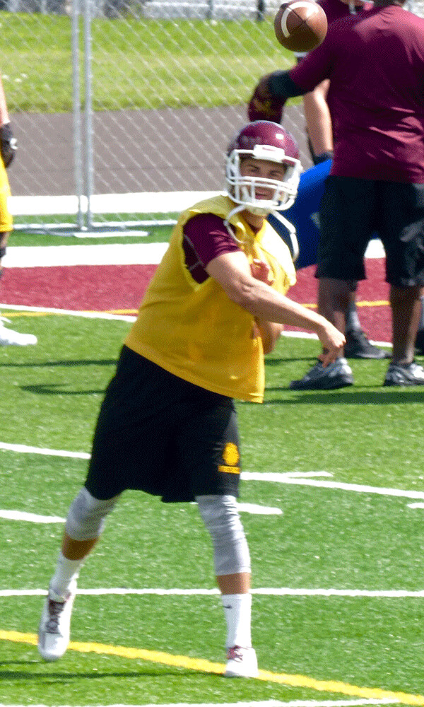 Mike Rybarczyk fired a quick pass out of a repetitive UMD passing drill. Photo credit: John Gilbert