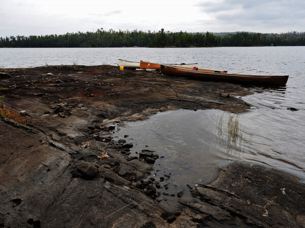We pulled our canoes up on the gently sloping rock in Disappointment Lake in the Boundary Waters Canoe Area Wilderness and spent some time discovering turbidites! Photo by Emily Stone.
