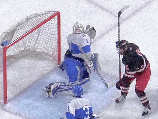 East's Austin Jouppi broke in for a shot that caused goalie Charlie Glockens to look back into the net for the puck, closing East to a 3-2 deficit. Photo credit: John Gilbert