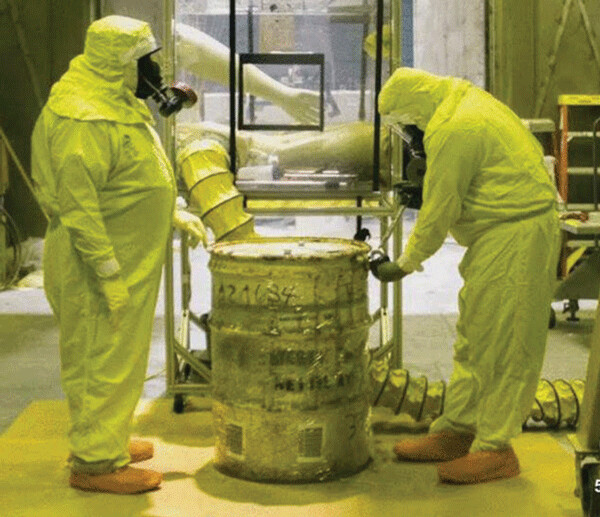 Workers at the Idaho National Laboartory. Photo by KPVI TV News, Pocatello Idaho, which reported April 12 that INL handles hazardous “materials like plutonium-contaminated filters, graphite molds, and sludges.” Up to three barrels of these sludges overheated and burst open April 11.