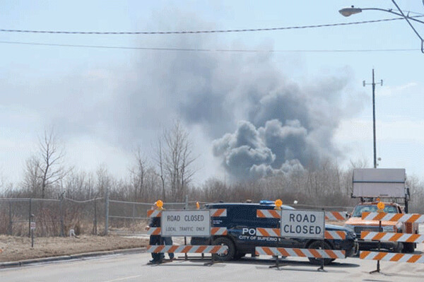 View of the smoke coming from Husky Energy refinery in Superior, Wisconsin, on April 26, 2018 after a fire broke out. Olivia Shalaby/WPR