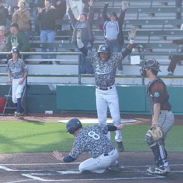 McArthur enjoyed his part in the base-clearing triple by Augie Isaacson, as the Huskies won an 8-7 walk-off victory over St. Cloud. Photo credit: John Gilbert