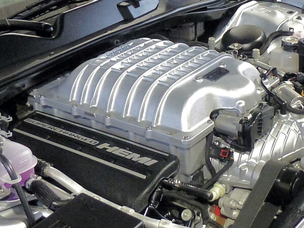 Supercharger rises atop 6.2-liter Chrysler Hemi V8 under the hood of the 2019 wide-body Challenger Redeye. Photo credit: John Gilbert