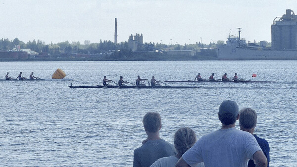 Fans and competitors watched as the Long Lake Rowing Club won the Junior Men’s 4-place final. Photo credit: John Gilbert