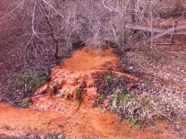 Acid Mine Drainage spills through an Ohio stream.   Credit: Ohio DNR
