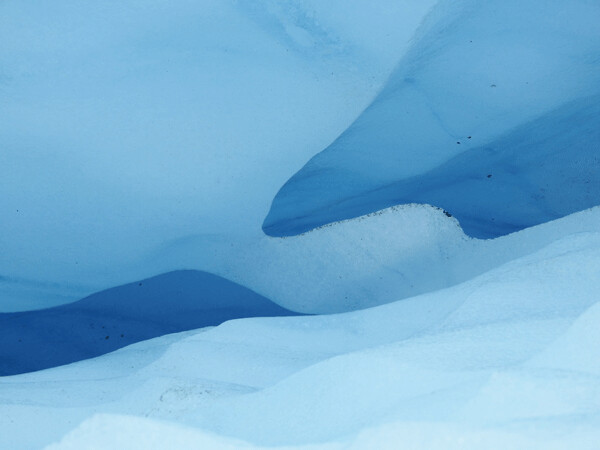 Crevasses are cracks in the glacier that open and close as the ice moves over uneven terrain. Photo by Emily Stone.