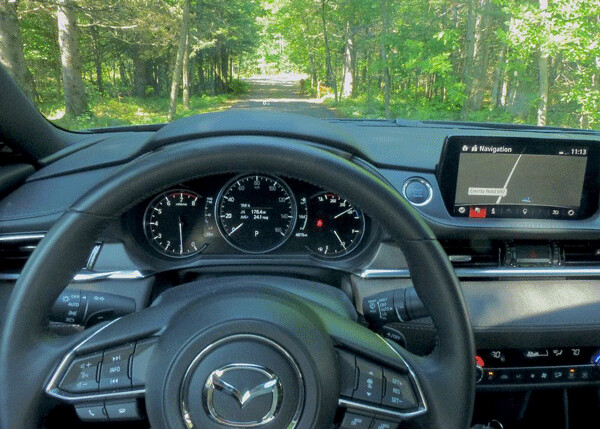 Cockpit like control from driver seat leaves vantage point to spot deer crossing the road ahead.  Photo credit: John Gilbert