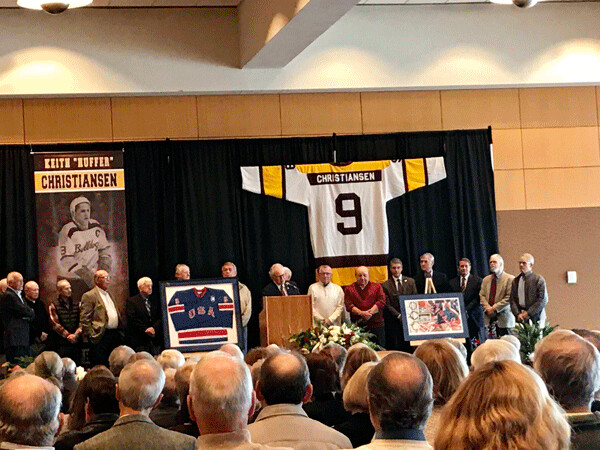 Former linemate Pat Francisco spoke at Keith (Huffer) Christiansen’s memorial service Saturday, with UMD teammates lined up behind him. Photo credit: John Gilbert