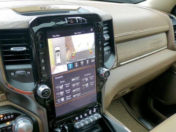 Huge info screen can be split to show full surround and information, in restyled dash. Photo credit: John Gilbert
