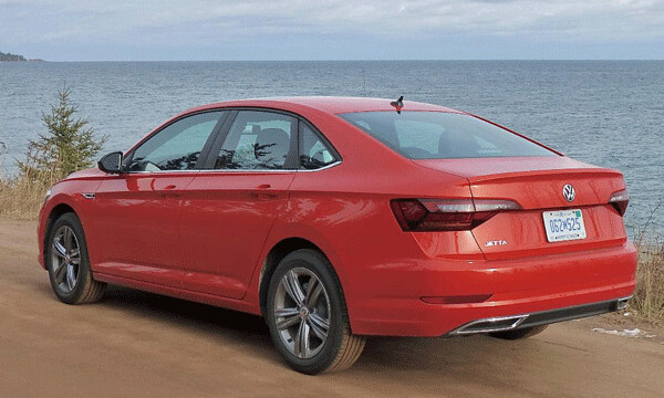 Viewed from the rear, the Jetta looks like a midsize car but it’s actually a roomy compact. Photo credit: John Gilbert