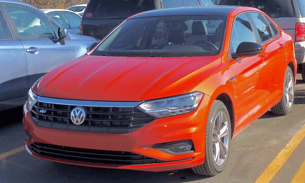 Styling, as well as Habanero Orange paint, makes the Jetta R-Line stand out in parking lots. Photo credit: John Gilbert