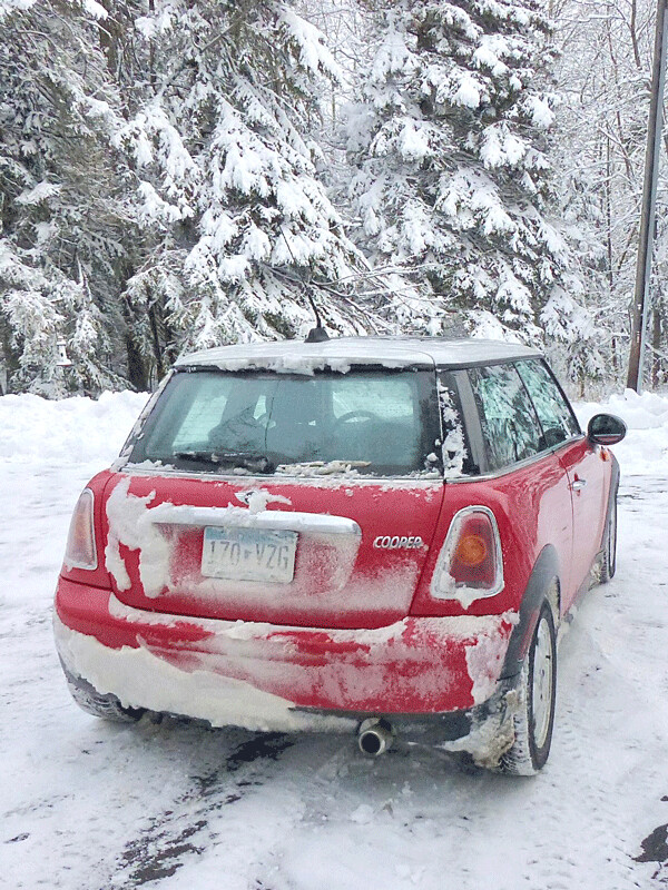 Plowing snow with the front, and accumulating it on the rear didn’t delay the Mini’s determined drive - registering 35.6 miles per gallon, too. Photo credit: John Gilbert