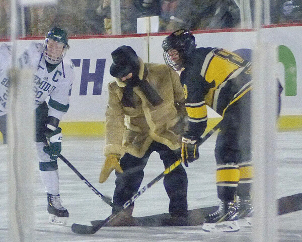 R.H. (Bob) Peters, former Bemidji State coach for 34 seasons and 13 national championships, dropped the ceremonial opening puck for the Bemidji State-Michigan Tech outdoor game.  Photo credit: John Gilbert