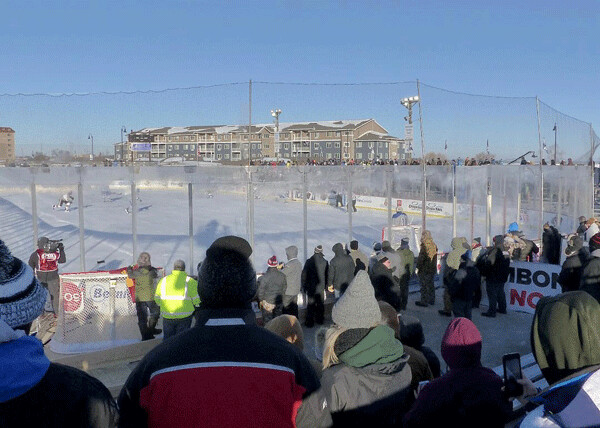 Hockey Day opened at 9:30 a.m. with bright sun, minus-29, and a ton of enthusiasm by the  unique opportunity to watch outdoor hockey. Photo credit: John Gilbert