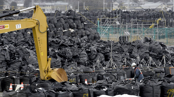 Over 19 million tons of radioactively contaminated soil have been collected in 1-ton bags  and stacked in thousands of places in Japan, since the triple meltdowns of March 2011.  Eleven million tons could be incinerated. KYODO photograph. 