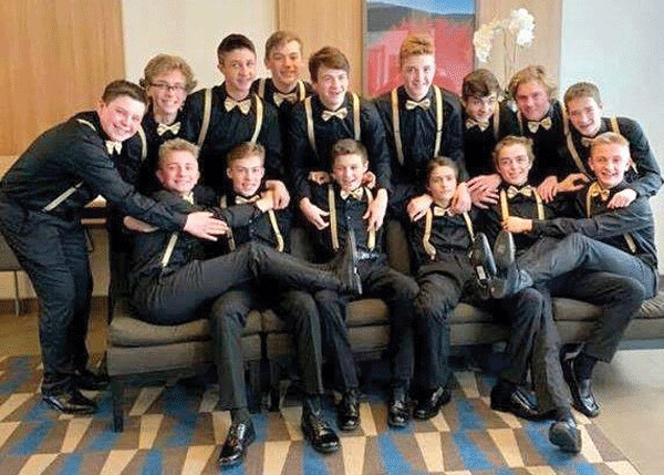 Denfeld’s A Bantam hockey team got all dressed up for a special team picture while winning the  consolation title at the state Bantam tournament in Moorhead. Photo credit: John Gilbert
