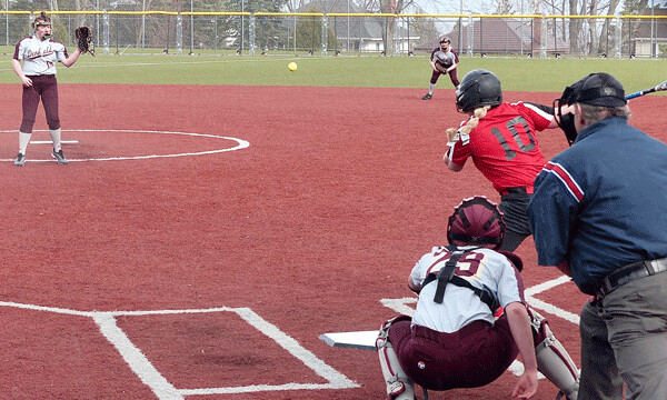 Duluth East freshman Cathy Bergstrom socked a triple to help the Hounds rally from a 6-0 deficit  to 6-3 against Denfeld. Photo credit: John Gilbert