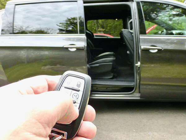 Push button on key fob operates sliding side doors for ease in loading people or stuff. Photo credit: John Gilbert