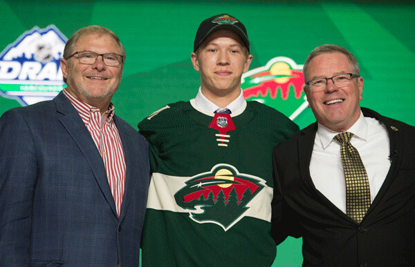 2019 WILD First Round pick Matthew  Boldy selected at #12, with Owner Craig Leipold  and GM Paul Fenton.