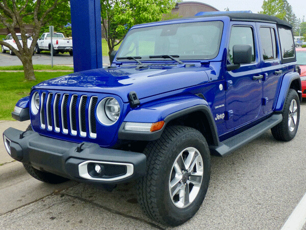 The Wrangler shows its contemporary utility-vehicle appearance in normal  street situations. Photo credit: John Gilbert