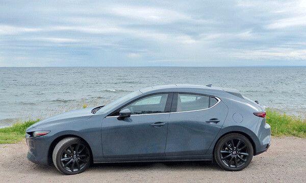 From the side, the Mazda3 strikes a distinctive pose parked alongside Lake Superior's North Shore. Photo credit: John Gilbert