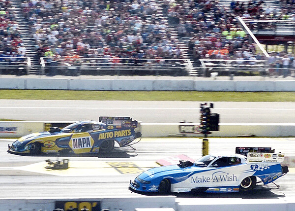 Ron Capps, an adopted Minnesotan, demonstrated a “hole shot” in the far lane to  beat Tommy Johnson Jr. for his sixth BIT Funny Car title. Photo credit: John Gilbert