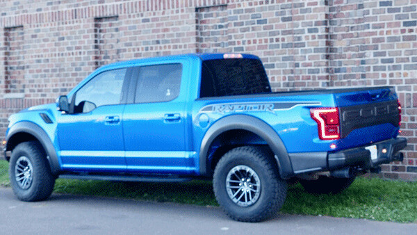 Full crew cab with graphics and unique, purpose-built Fox shocks make the Raptor unbeatable off-road, smooth on it. Photo credit: John Gilbert