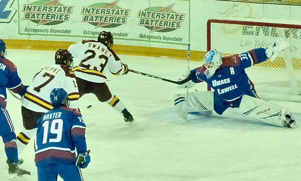 Lowell goalie Tyler Wall made another big save on another big scoring chance by Nick Swaney in Game 1. Photo credit: John Gilbert