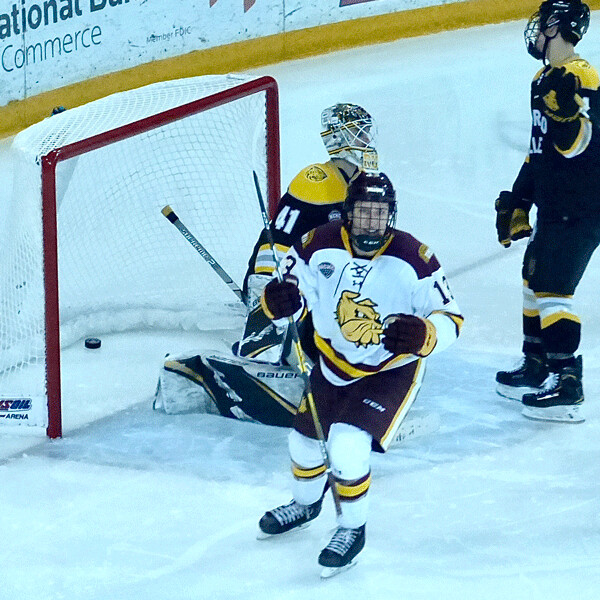 UMD's Tanner Laderoute finished screening in time to celebrate the first of two Noah Cates goals that helped beat CC 5-0 Saturday. Photo credit: John Gilbert