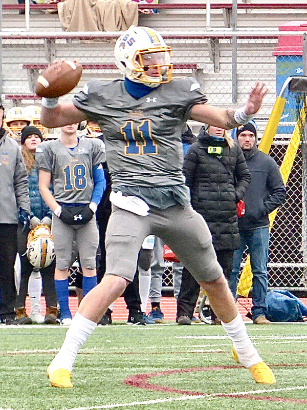 St. Scholastica star quarterback Zach Edwards not only filled the record book, he was the star of the Sixth Annual FCS Bowl. Photo credit: John Gilbert