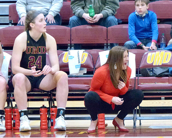 UMD coach Mandy Pearson may have spotted a call she didn't like and expressed herself, as top scorer Brooke Olson sat next to her with five fouls at the end of the 68-67 nail-biter. Photo Credit: John Gilbert