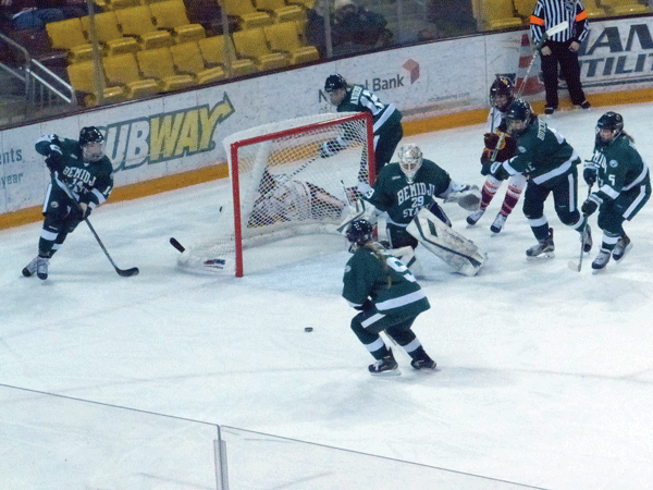 All five Bemidji State skaters defended goaltender Brittni Mowat as she beat UMD 3-2 in the first game of their series. Mowat has yielded just three goals on 118 shots in sweeping all four games against UMD. Photo Credit: John Gilbert