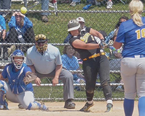 UWS's Katie White fought off a pitch by St. Scholastica ace Chrisi Mizera for a single that drove in the winning run in the top of the seventh.